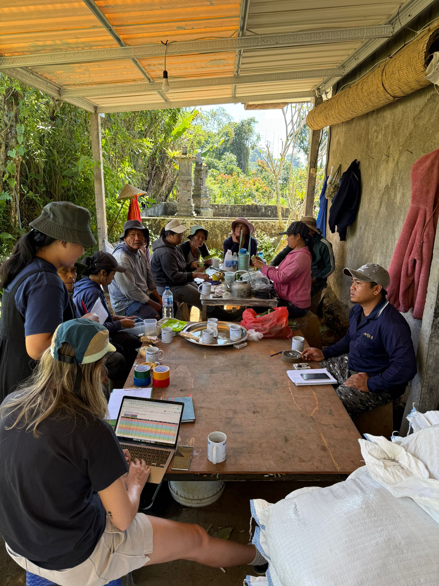 Phi Earth field team meeting with local agricultural partners in Bali