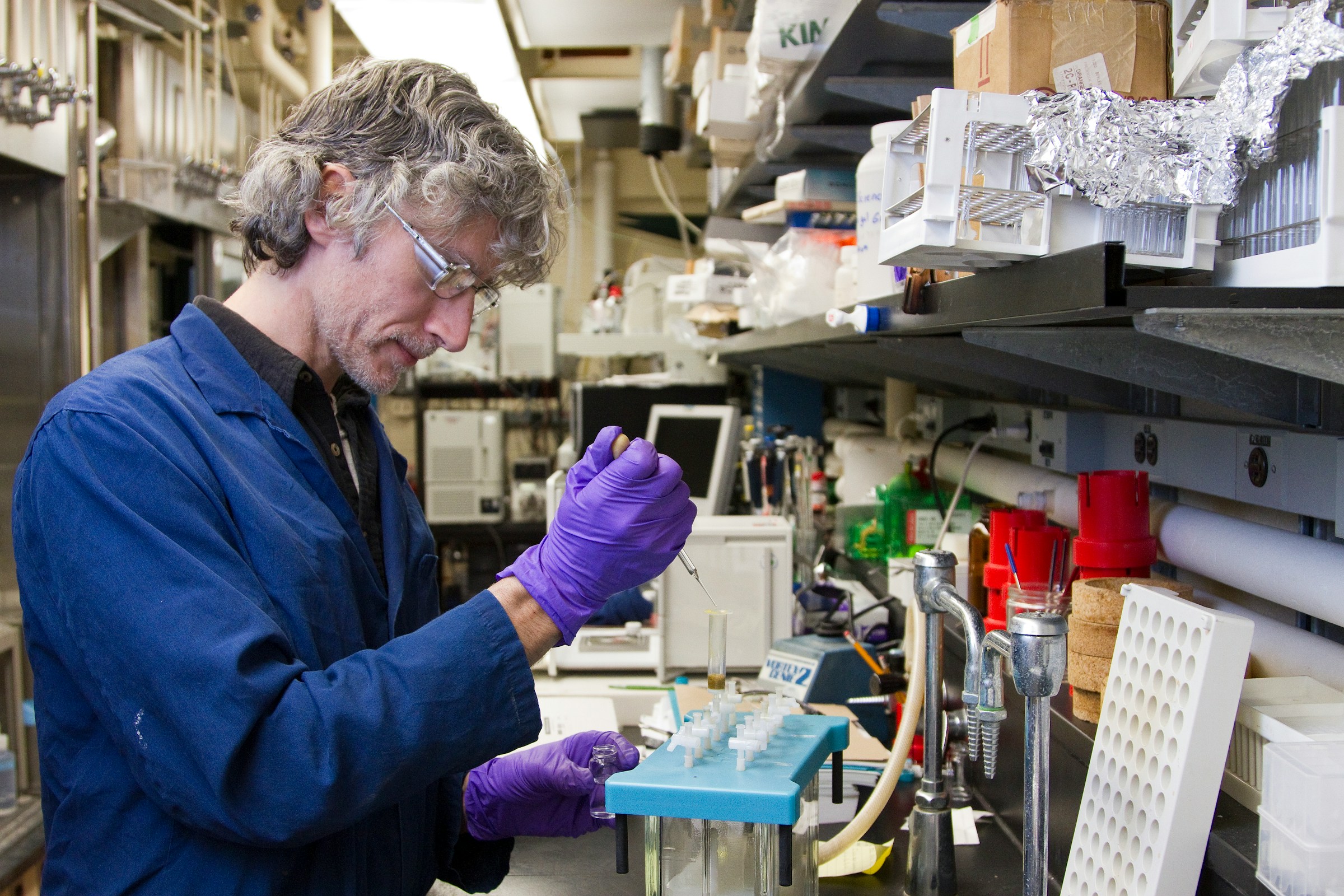 Laboratory technician preparing a sample for analysis